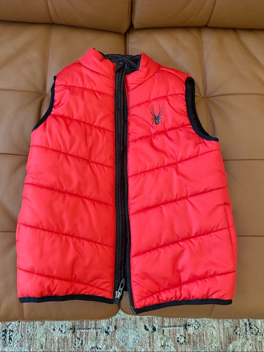 Spyder Red and Black Quilted Vest.Worn once.Almost new